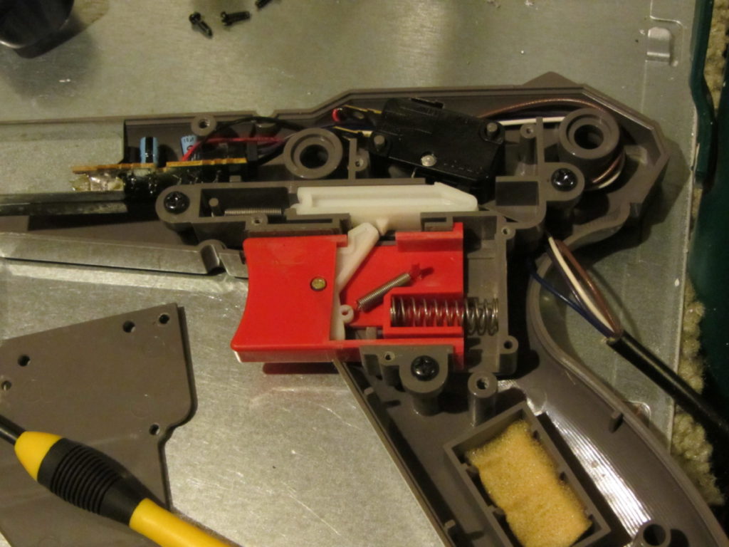 The inner workings of the Nintendo Zapper trigger.